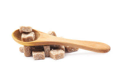 Pile of brown sugar cubes isolated