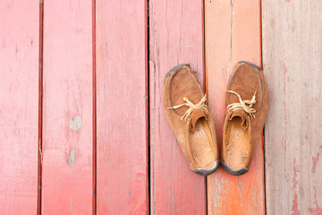 Men's Loafer Shoe on old wood background