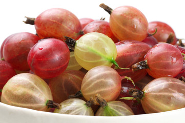 Gooseberries close-up on white
