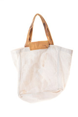 Grunge cotton bag on white background