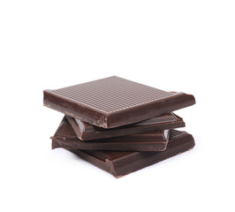 Pile of chocolate bar pieces isolated