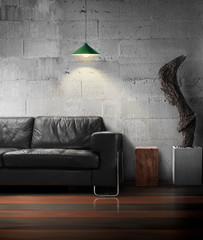 black sofa and wooden sculpture with light of lamp in loft living room