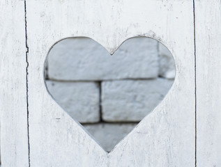 The white wooden with heart shape