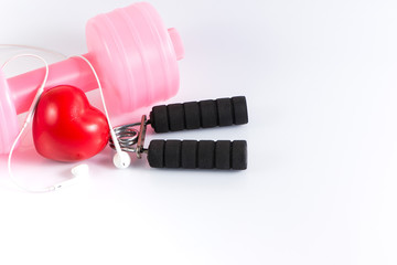 Fitness background with bottle of handgrip and heart