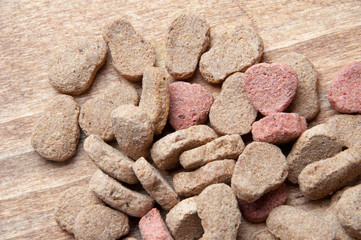 The image of dog food on a wooden table