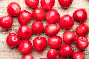 Fresh cherries on a wooden table