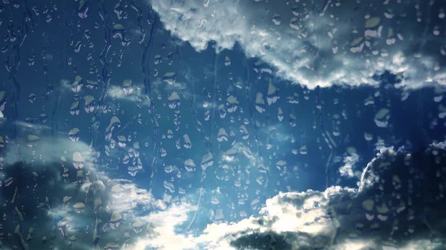 moody rain on window blue sky clouds (composite)