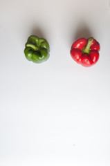 Red and green sweet pepper isolated on a white background