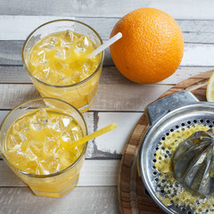 The cooled drink with fresh lemon and orange