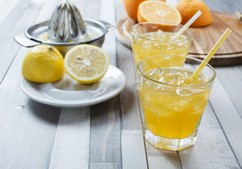 The cooled drink with fresh lemon and orange