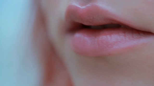 Beautiful shape of the lips, close-up camera moves