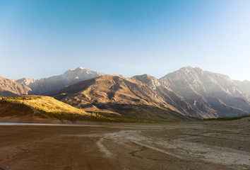 Mountain reflection on lake at sunrise