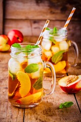 Peach ice tea in mason jar with mint