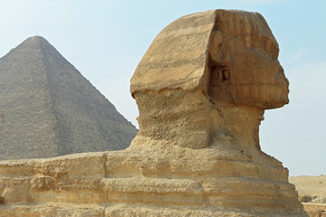 Sphinx statue and Pyramid in Giza Egypt. Ancient architecture
