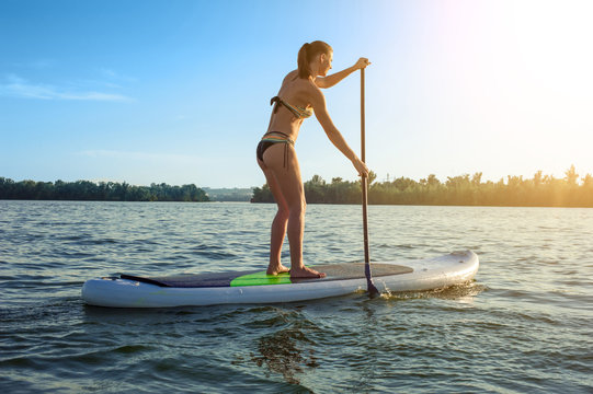 SUP Stand up paddle board woman paddle boarding12