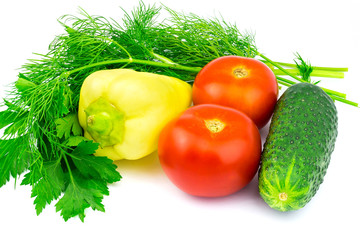 Group of vegetables and green herbs isolated on white background.