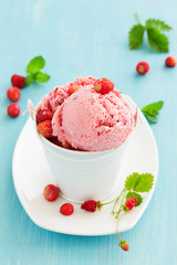 Homemade ice cream with wild strawberry.