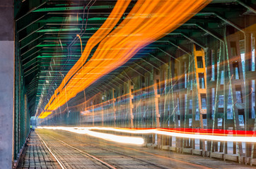 Tram light trails on Gdanski bridge in Warsaw, Poland