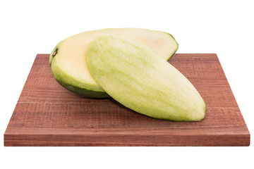 Fresh mango - Sliced green mangoes on wooden with isolated white