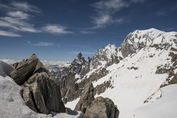 Fototapeta na wymiar Mont Blanc peak and Aiguille Noire de Peuteurey, Mont Blanc massif, Helbronner point, Italy