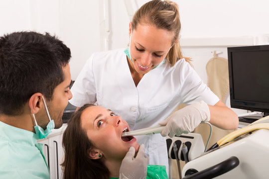 Patient is examined at dental clinic