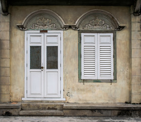 Ancient of Wooden doors and wooden window with traditional patte