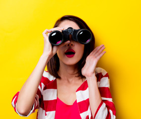 young woman with binoculars