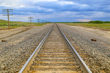 Obraz na płótnie Canvas Railroad Tracks and Transmission Lines