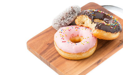 donut on wood block isolated