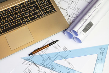 An office desk with the project papers