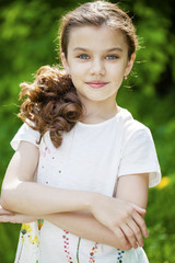 Fototapeta premium Portrait of a beautiful young little girl