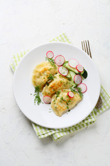 dumplings with potato and salad