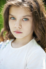Fototapeta premium Portrait of a beautiful young little girl