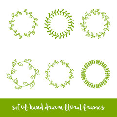 Set of six hand drawn circle floral frames.