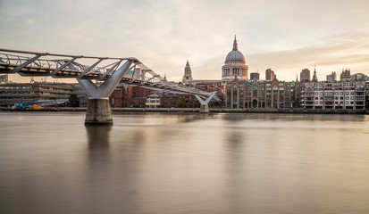 Fototapeta na wymiar St Pauls Cathedral and Millenium Bridge from across the River Th