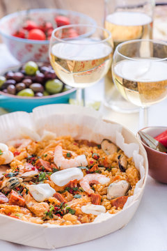 paella and white wine