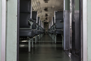 Naklejka na ściany i meble Steel chair in train