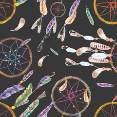 Seamless pattern with dreamcatchers and feathers in the air, hand drawn in watercolor on a dark background