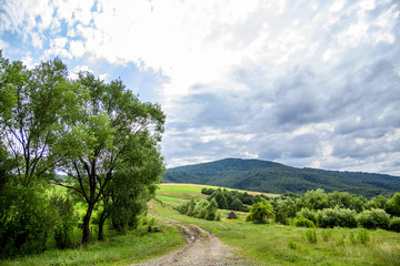 Fototapeta na wymiar Carpathian Mountains ROAD TO MOUNTAINS Earthworks