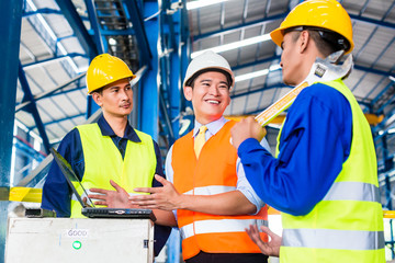 Team in Factory at production training