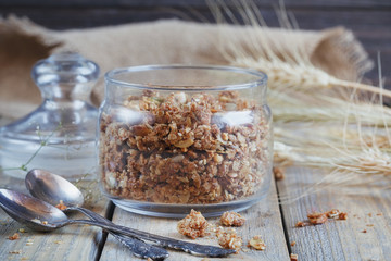 Granola, berries and ears of wheat and oats