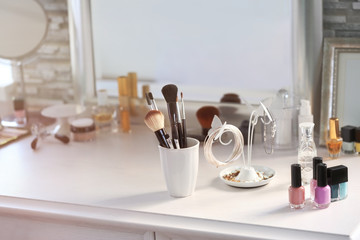 Cosmetic set on light dressing table