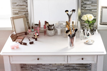Cosmetic set on light dressing table