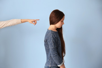 Family problems concept. Mother punishing daughter