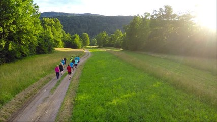 Group of athletes running together on a 10km long nature trail. Aerial drone view.athletes who run 10km / RIBNICA, SLOVENIA,JULY 2 2016