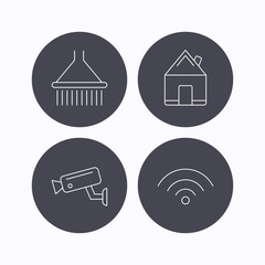 Wi-fi, video monitoring and real estate icons.