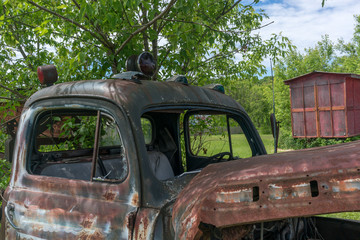old rusty truck on the grass