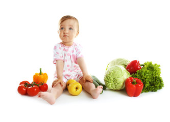 Fototapeta na wymiar Cute baby girl with vegetables, isolated on white