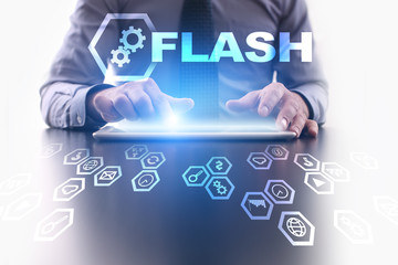 Businessman is using tablet pc and selecting Flash icon.