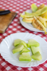 Sliced melon isolated over white background with copy space
